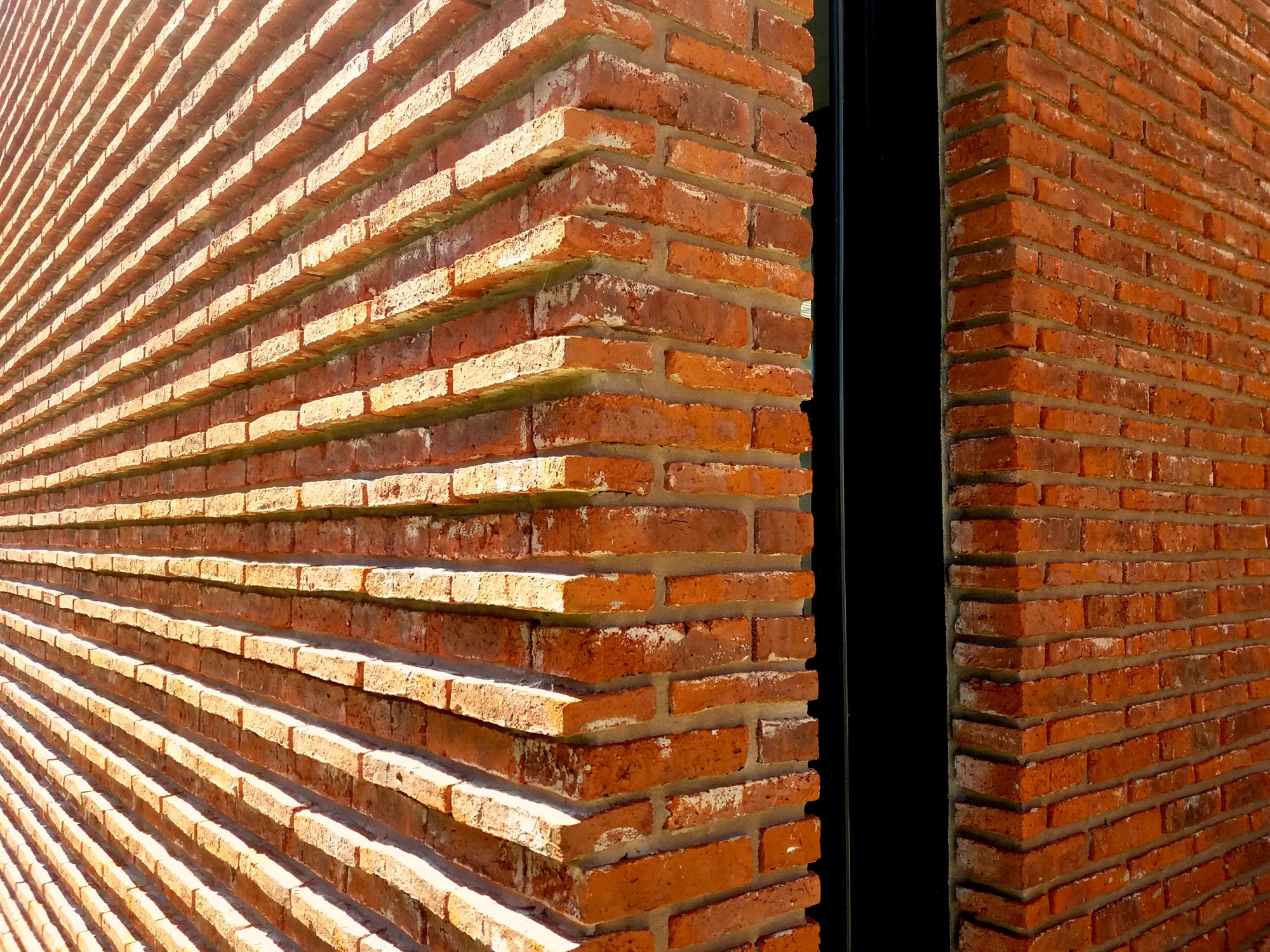 Detalle de la fachada de ladrillo de Casa A